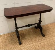 A mahogany side table on barley twist supports ending in splayed carved and scrolling feet (H69cm