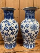A pair of blue and white ceramic vases