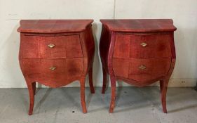 A pair of faux Shagreen red bombe fronted bedside table by Ginger Brown