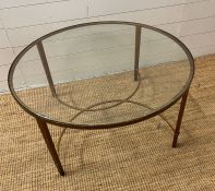 A contemporary coffee table, circular frame and glass top (H47cm Dia90cm)
