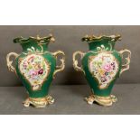A pair of 19th Century green grounds floral decorated two handled vases, hand painted H23cm