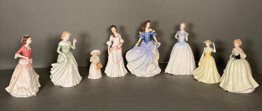 A selection of eight Royal Doulton figures to include Susan, Grace and Lily