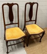 A pair of Chippendale style Edwardian side chairs