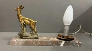 Art Deco lamp base on marble plinth with metal dear.