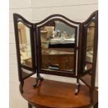 A Mahogany folding toilet mirror with splayed feet