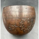 A carved coconut bearing the inscription 'William Bartholmew July The 13 1766 (AF One large crack)