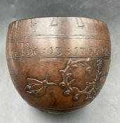 A carved coconut bearing the inscription 'William Bartholmew July The 13 1766 (AF One large crack)