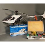 A vintage Kyosho concept radio controlled helicopter with cased Macgregor power panel and JR propo