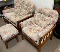 A Mid Century lounge suite comprising of two seater sofa, a chair and a footstool (H89cm W68cm