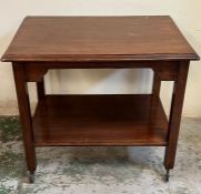 A Mid Century side table on wheels