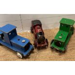 Three wooden vintage pull along trains, one by Puff Puff