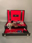 A selection of costume jewellery in a jewellery box