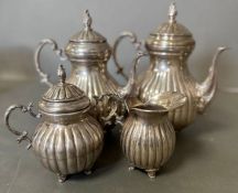 A Four Piece Silver tea service marked 925, with teapot AF, hot water jug, milk jug and sugar