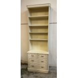 A white painted dresser with four shelves and two over two drawers under by Olympus (H224cm W77cm