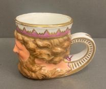 A crowned Neptune mug stamped Derby to base