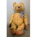 An unusual and early straw filled teddy bear, probably English, perhaps Chiltern, with lovely