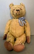 An unusual and early straw filled teddy bear, probably English, perhaps Chiltern, with lovely