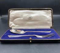 A cased Christening set of fork and spoon, hallmarked for London