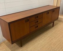 A Mid Century two cupboard three drawer sideboard by William Lawrence (H74cm W200cm D44cm)