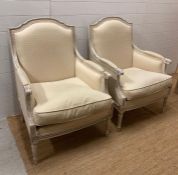 Two white Louis style arm chairs