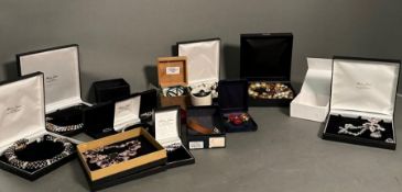 A selection of quality costume jewellery, boxed.
