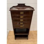 A mahogany music cabinet with brass handles (H110cm W54cm D37cm)