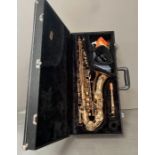 A Jupiter brass Alto saxophone cased