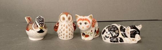 A selection of four Royal Derby paper weights to include Owlet, Misty and Kitten, all gold stoppers