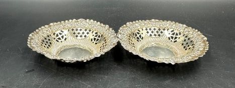 Two pierced silver pin dishes, hallmarked for Birmingham.