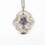 An amethyst pendant and chain, 9 carat gold