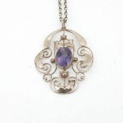 An amethyst pendant and chain, 9 carat gold