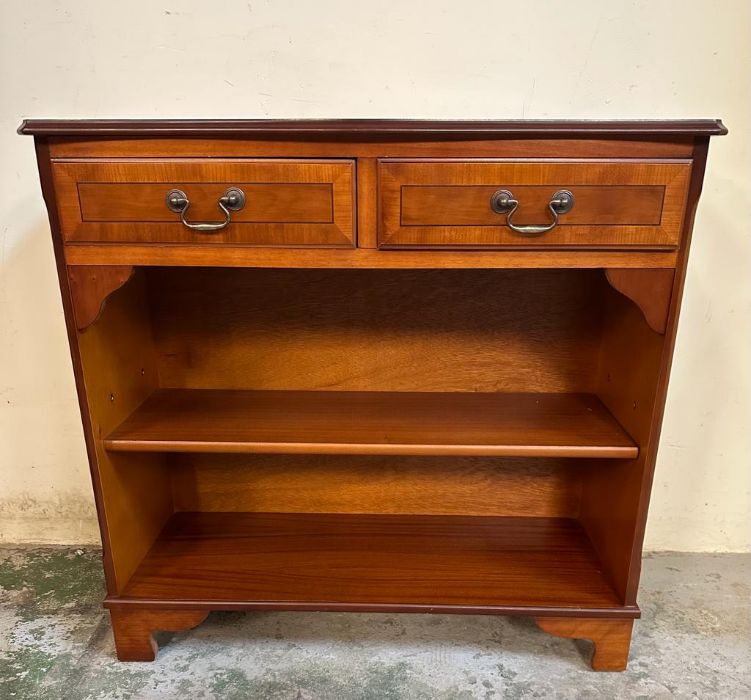 A two drawer single shelf bookcase with inlaid top (H74cm W76cm D29cm)