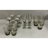 A Selection of smoked glassware, tumblers, champagne coupes etc
