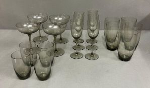 A Selection of smoked glassware, tumblers, champagne coupes etc