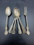 A selection of hallmarked silver flatware including three matching Georgian teaspoons makers mark