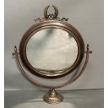 A Brass framed oval mirror (50cm H)