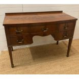 A Mahogany knee hole dressing table comprising of 5 draws