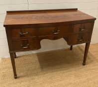 A Mahogany knee hole dressing table comprising of 5 draws