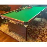 A folding pool/snooker table with sundries