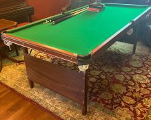 A folding pool/snooker table with sundries