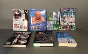 A selection of seven astronautical biographies signed by the astronauts. To include Wally Schirra,