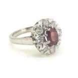 Oval ruby and diamond cluster ring. Ruby natural no heat 18 carat gold hallmark 1978