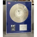 Platinum disc for record sales of MCA album "Phantasmagoria" 1986