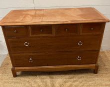 A side cabinet with four small drawers to top and two long drawers by Stag Furniture (H70cm W107cm