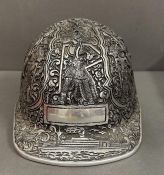 A Noor Raharjo Indonesian silverware miners helmet (28.5 cm front to back, 22cm width and 16.5cm