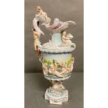 A Meissen figural porcelain ewer, dolphins, cherubs and fawn to handle H38cm