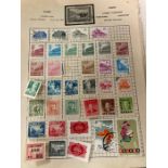 A selection of loose sheets of world stamps