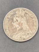 An 1892 Victoria Crown coin