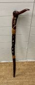 A turned wooden walking cane