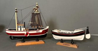 Two wooden painted boats, a Life Boat and a Fishing Trawler